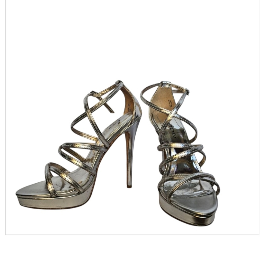 Bebe. Size 5M. Silver. Very Good Pre-owned Condition w/ Box. Orig. Price- $215